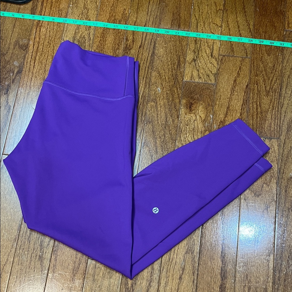 44. Lululemon wundertrain high rise 28” size 14  college purple legging